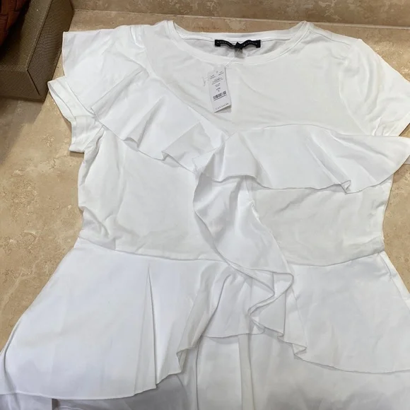 WHITE HOUSE BLACK MARKET White Peplum top. Size S - Picture 1 of 4